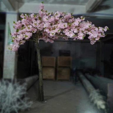 Kunstig Dekorativ Lyserød Kirsebærblomstring med grønne blad